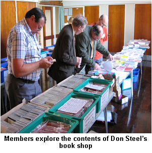 Members explore the contents of Don Steel�s book shop