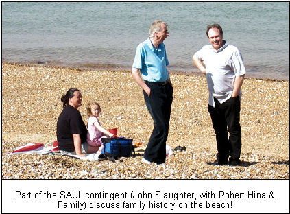 Part of the SAUL contingent (John Slaughter, with Robert Hina & Family) discuss family history on the beach