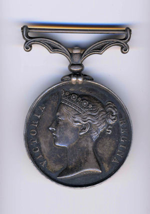 Cawnpore Medal Side1: This is the medal awarded to William Tomkins Saull for his part in the Mutiny of 1857.  The perimeter bears "Wm SAUL 3rd BENGAL EURPn REGt". (sp: Saul should be Saull).