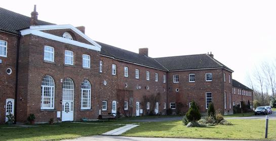 The former workhouse at Wicklewood, now converted to flats 
